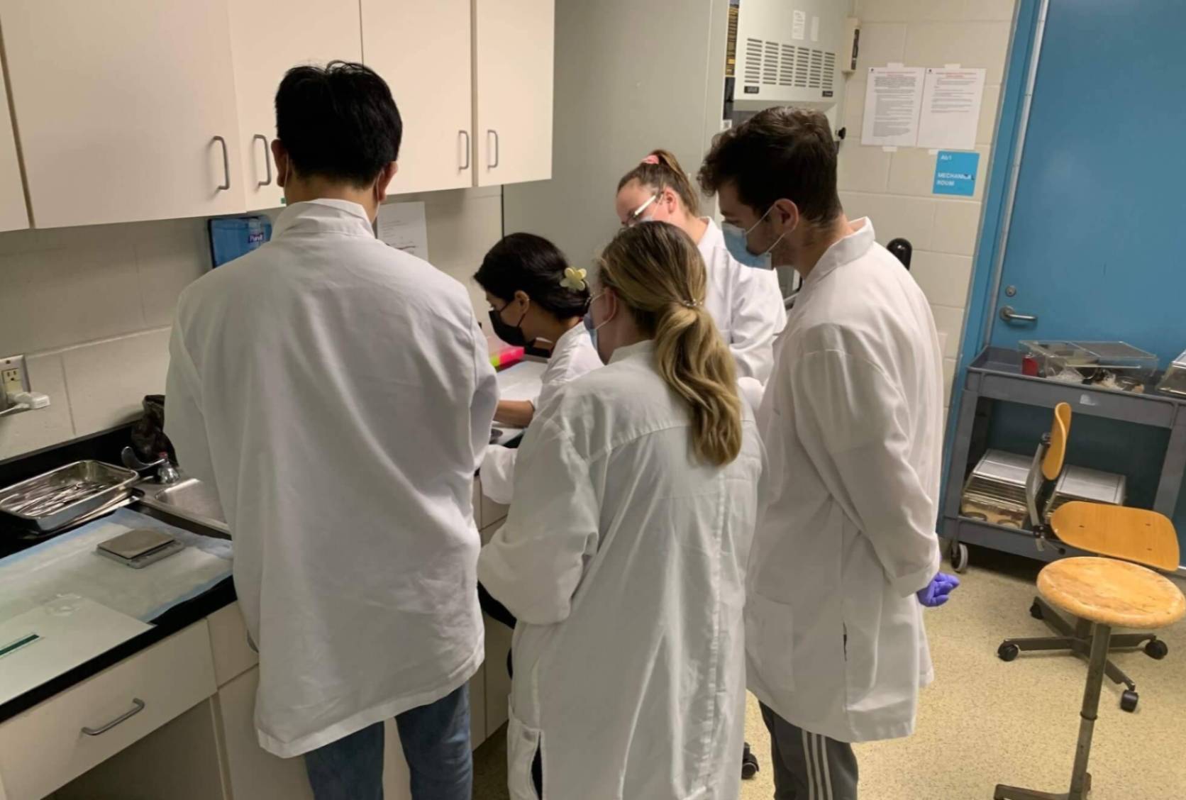 PhD students in lab coats